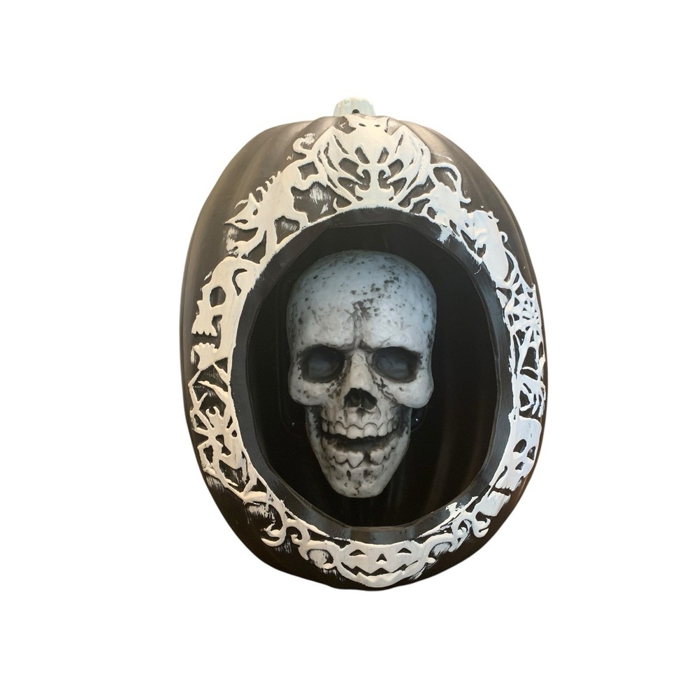 Gemmy Halloween Motion Activated Talking Skull in Black Carved Pumpkin